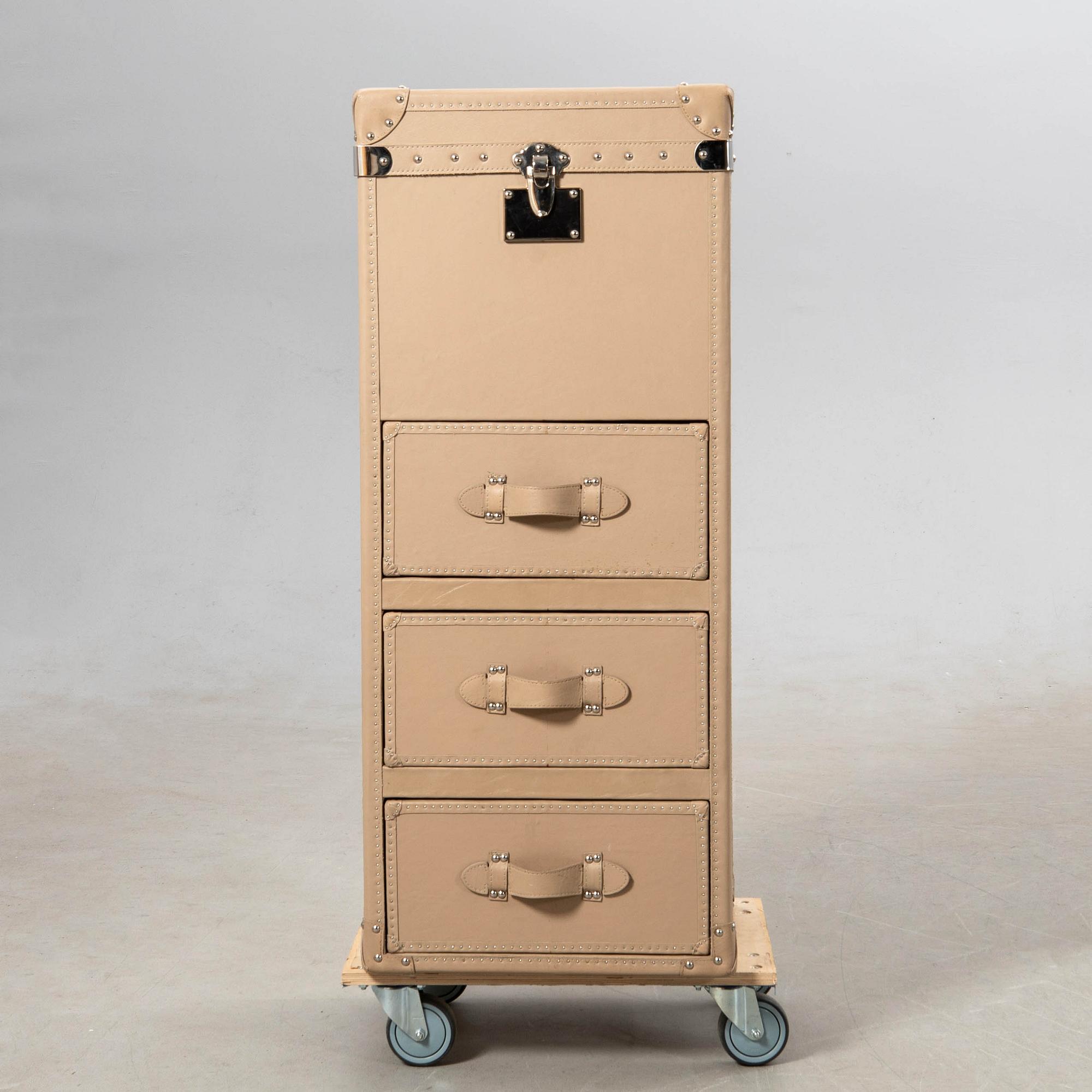 Translation: "Kelly Hoppen chest of drawers England modern production".