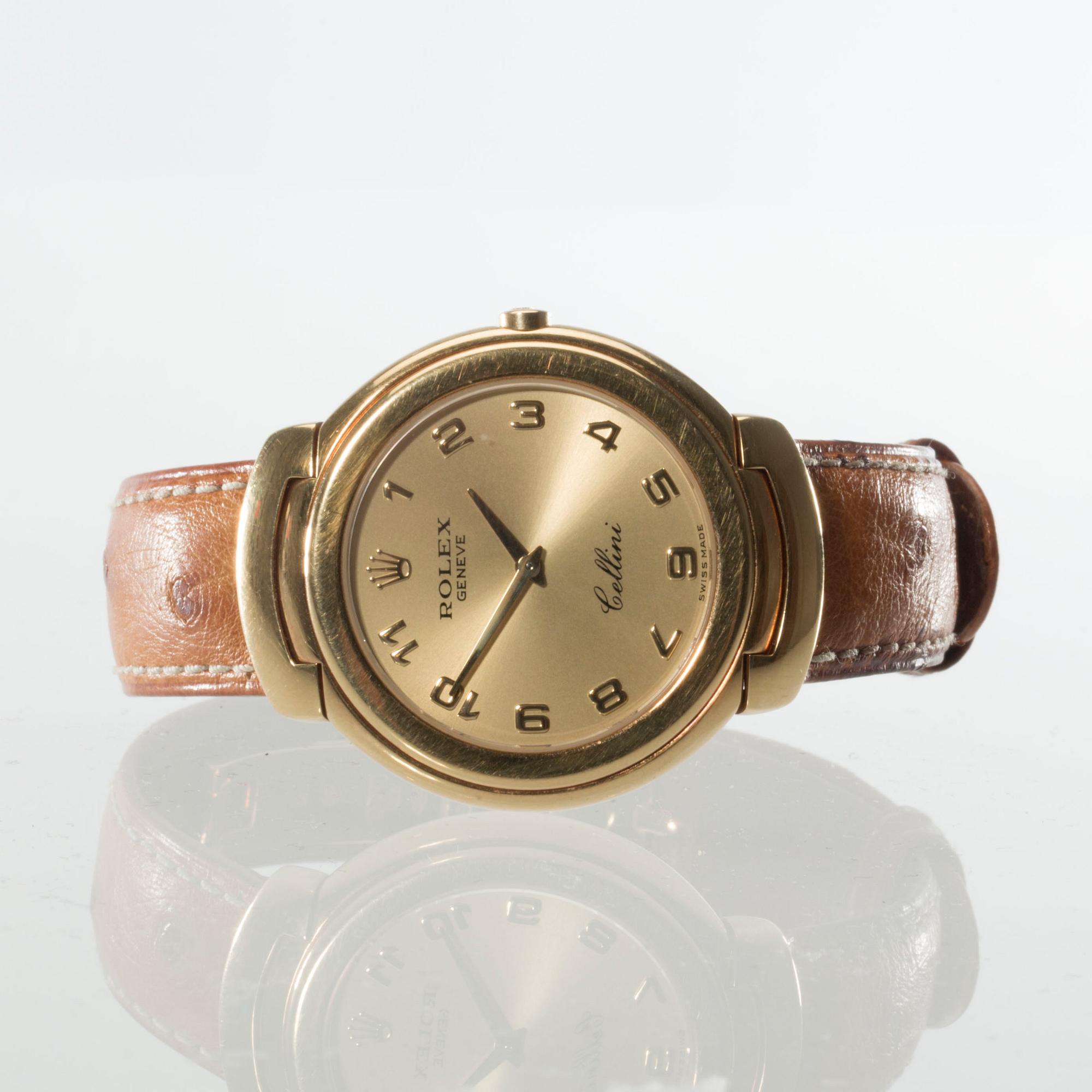 HERRARMBANDSUR, 18 k guld, Rolex, Cellini, Quartz. Vikt ca 72 g.