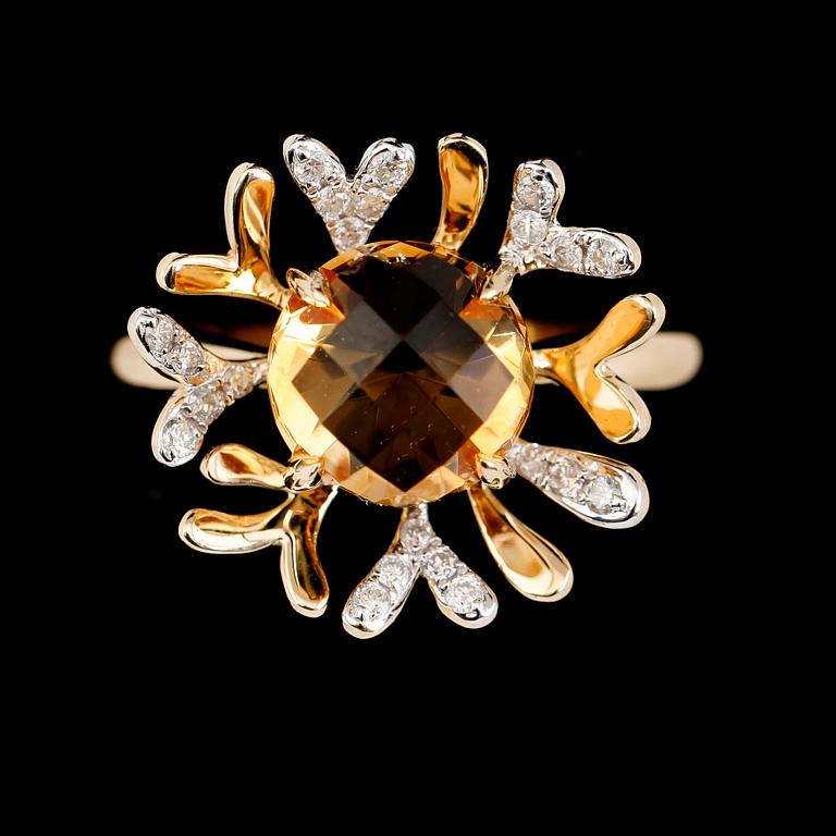 RING, 14K guld, citrin och briljantslipade diamanter. Vikt ca 4 g.