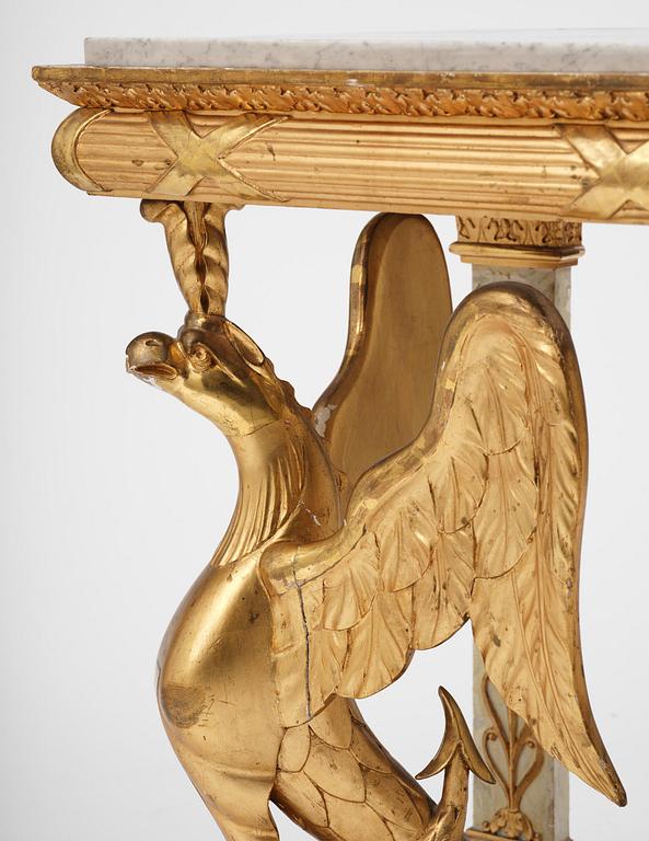 A Swedish Empire gilt wood and white marbel console table.