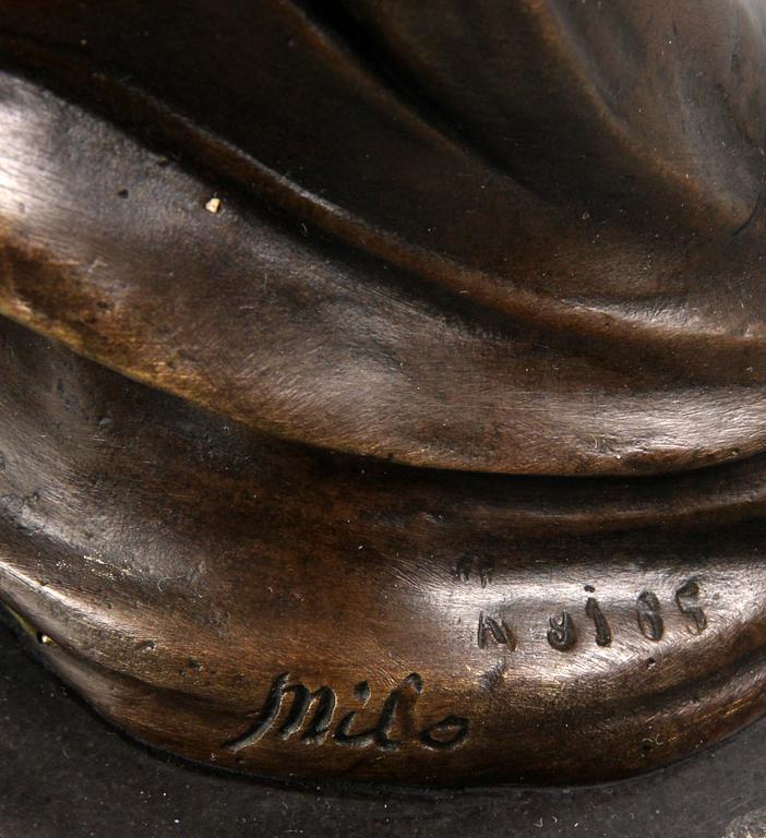 LJUSSTAKAR ett par, brons, sign Milo.
