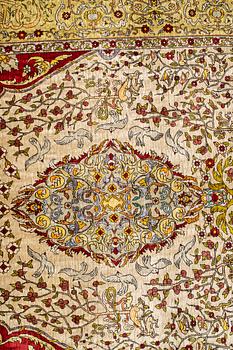 A rug, Old silk Hereke, ca 178 x 119 cm.