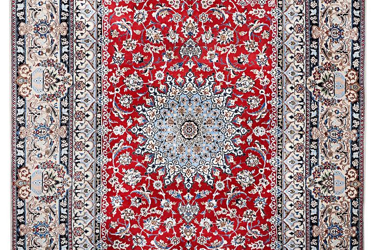 A Nain carpet, part silk, 6 laa, c.303 x 184 cm.