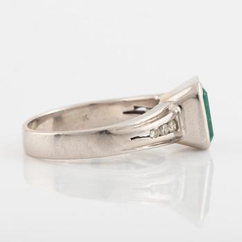 Emeralt cut emerald and brilliant cut diamond ring.