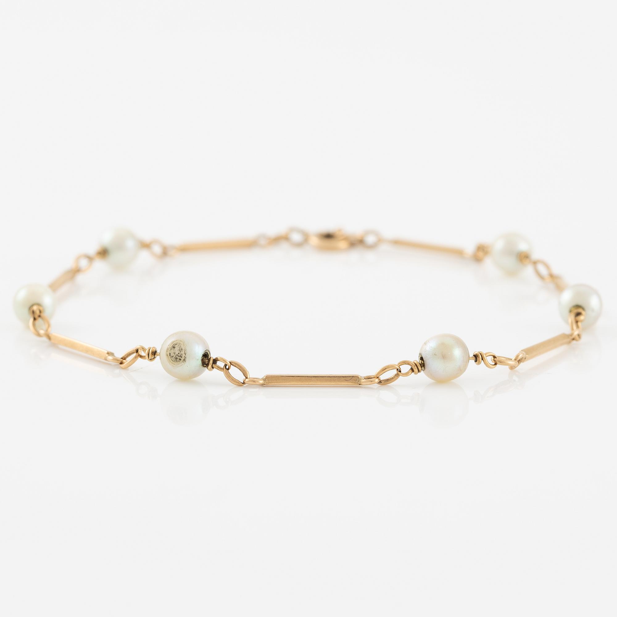 Armband, 18K guld med pärlor.