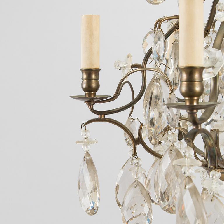A rococo style chandelier, early 20th century.