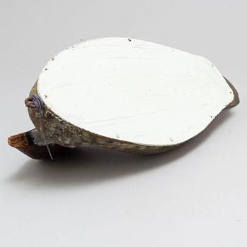 A early 20th century painted wood bird.