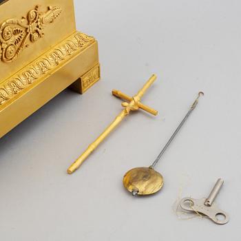 An empire mantel clock, first half of the 19th century.
