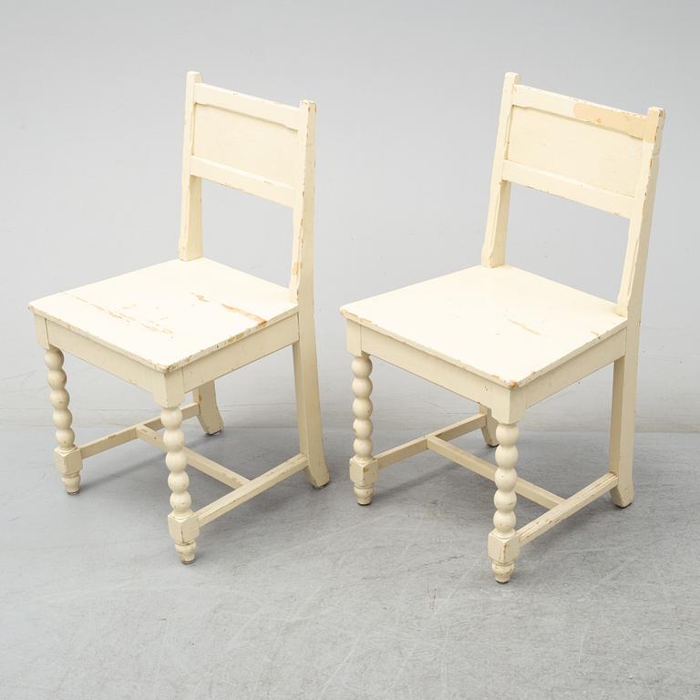 A set of table and two chairs, baroque-style, 20th century.