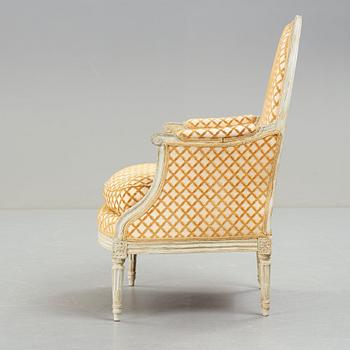 A Louis XVI-style bergere, 20th century.