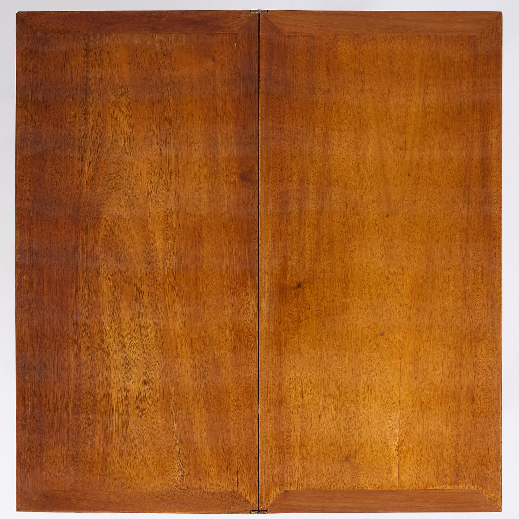 A late Gustavian mahogany games table, presumably by A. Nordström (Journeyman at G. Iwersson 1806-09).