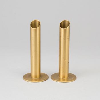 A pair of Swedish brass candlesticks/vases, mid 20th Century.