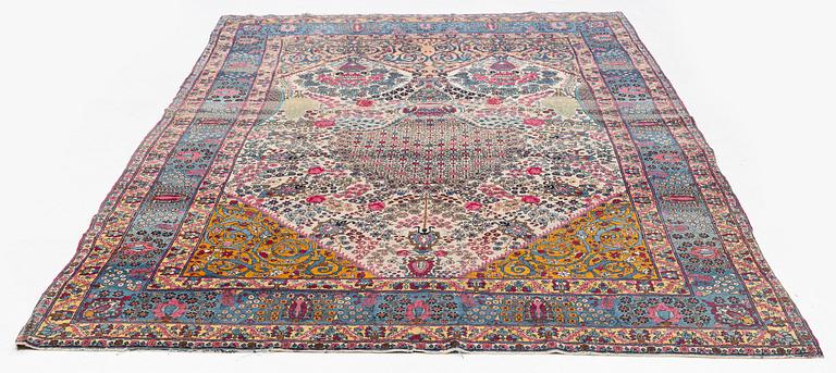 An antique Tehran carpet, north Persia, c. 323 x 195 cm.