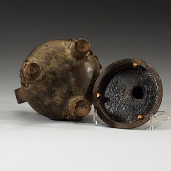 A bronze tripod censer with cover, late Ming or early Qing Dynasty, 17th Century.
