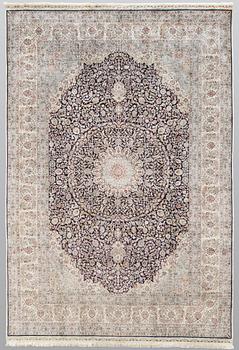 A carpet, Oriental silk, ca 297 x 202 cm.