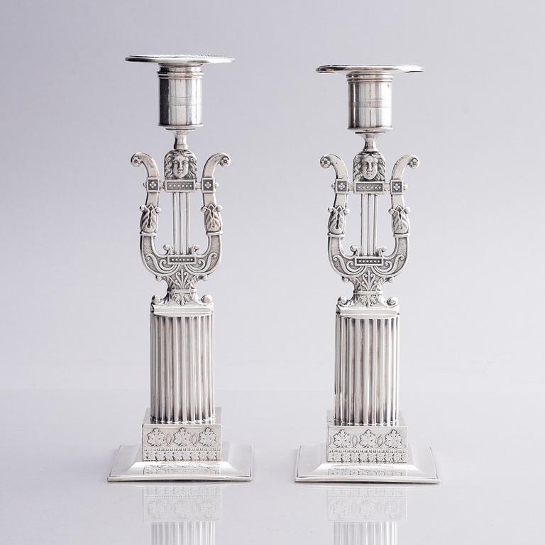 A pair of Swedish silver candlesticks, marks of Gustaf Folcker, Stockholm 1825.