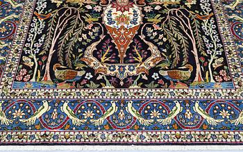 A figural Shahreza carpet, approx. 310 x 220 cm.