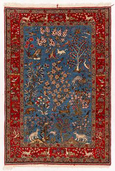 A Quum rug, figural, c. 210 x 142 cm.