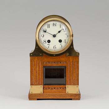 A jugend table clock from early 20 th century.