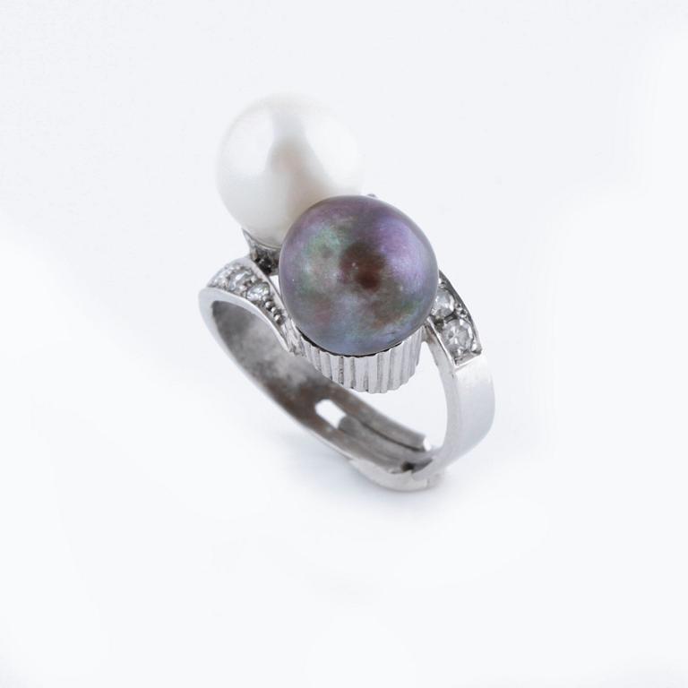 A cultured pearl and single cut diamond ring.