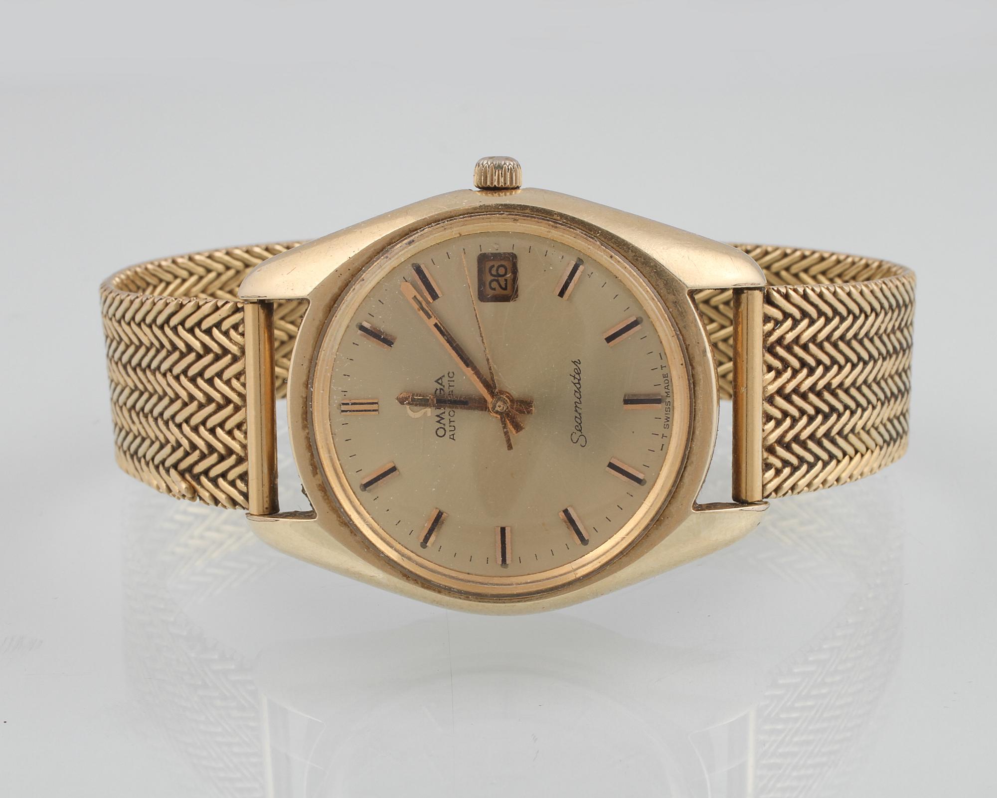 HERRARMBANDSUR, förgylld, Omega Seamaster. Vikt 87,0 gram.