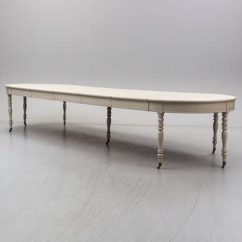 A mid 19th century painted dining table.