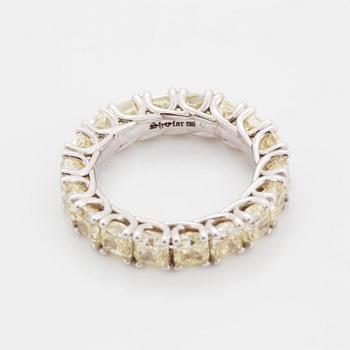Cuschion-cut diamond eternity ring.