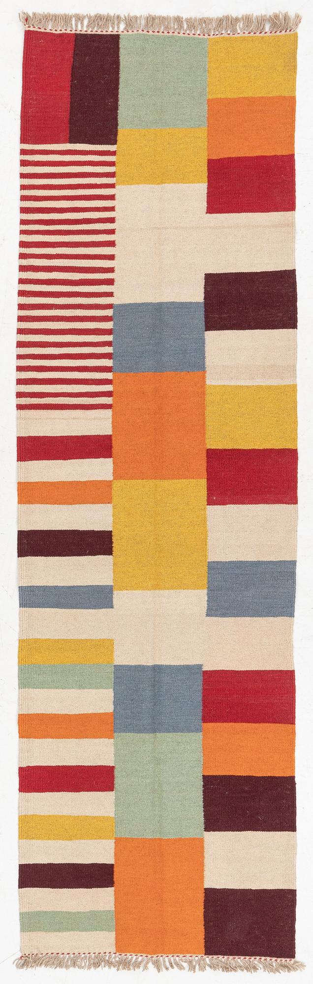 A Kilim runner, c. 297 x 85 cm.