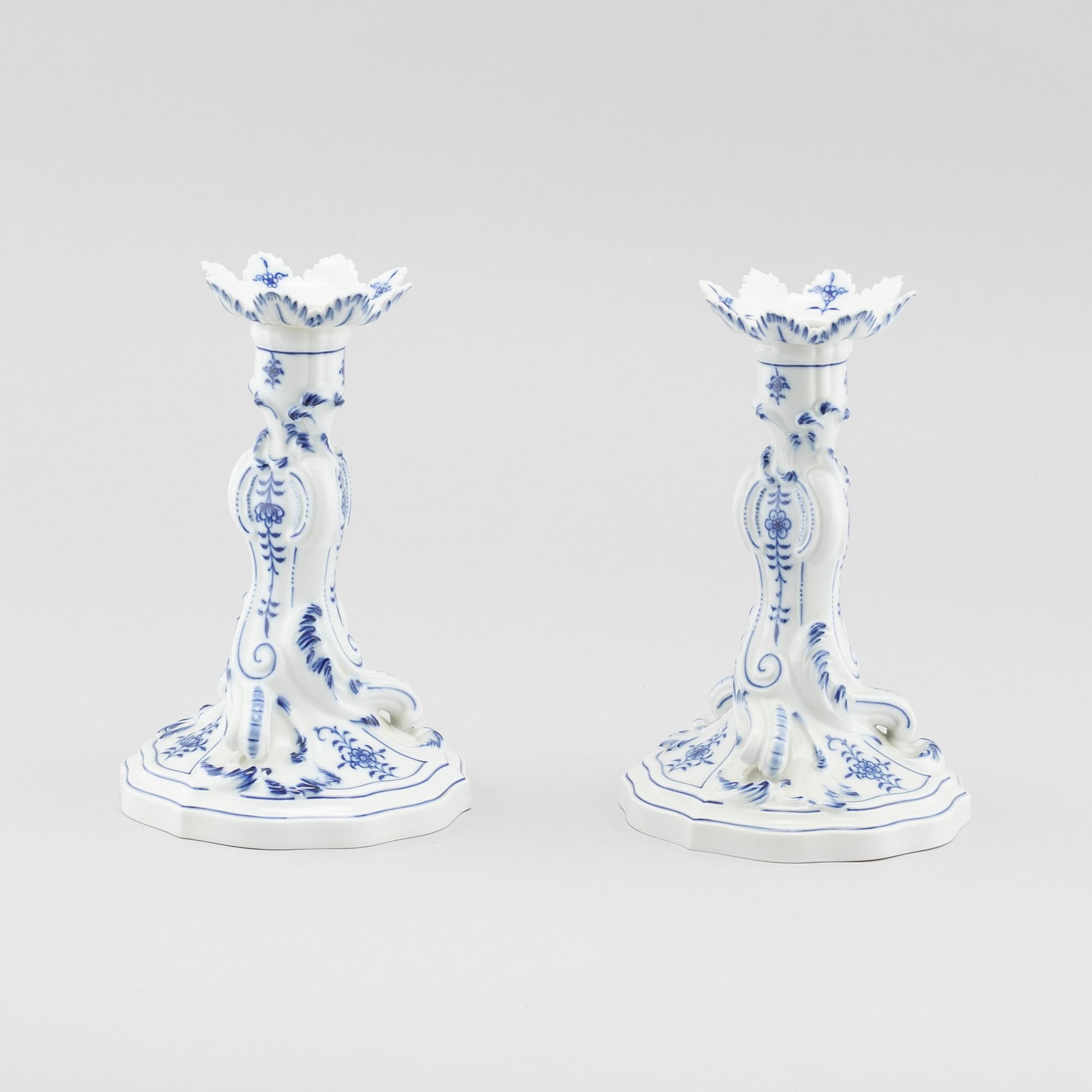 A pair of porcelain candle sticks by Meissen, second half of the 20th century.