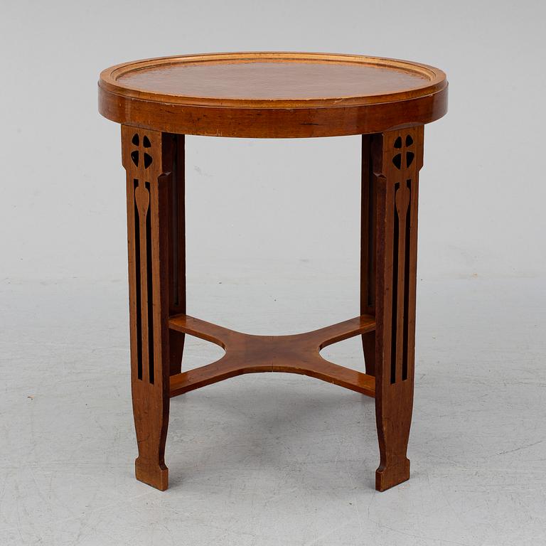 A copper and mahogany table by Nordiska kompaniet.