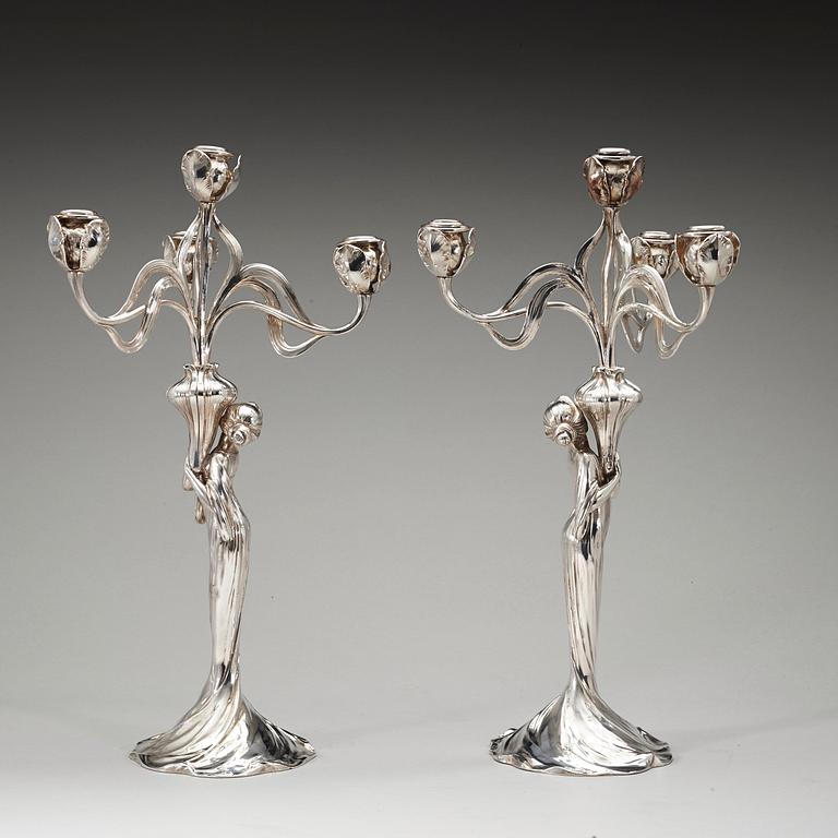 A pair of Art Nouveau silver plated four-light candelabra by Würtenbergische Metallwaren Fabrik (WMF), Germany.