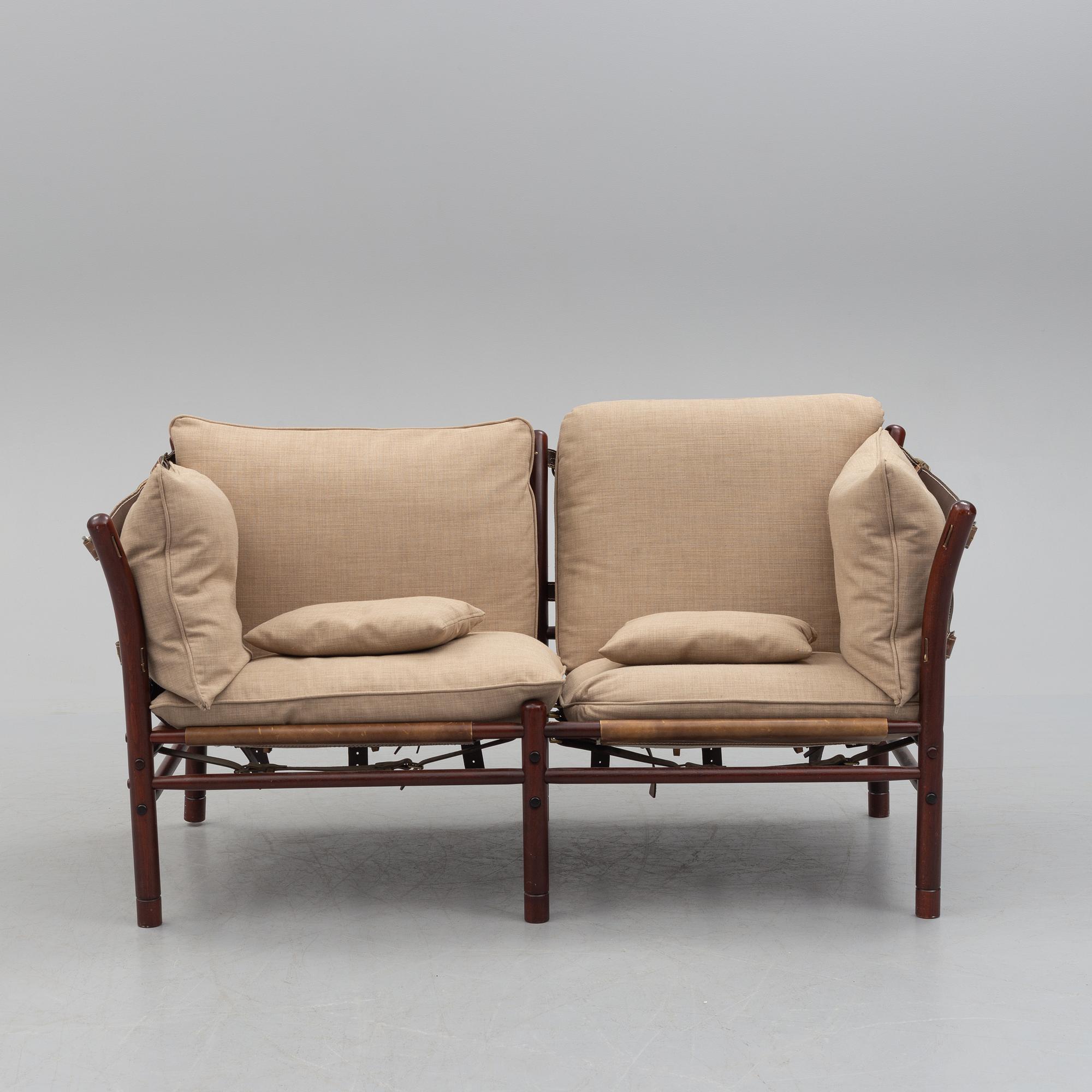 ARNE NORELL, an 'Ilona' stained wood and leather sofa fron Norell Möbel, Aneby, 1960's/70's.
