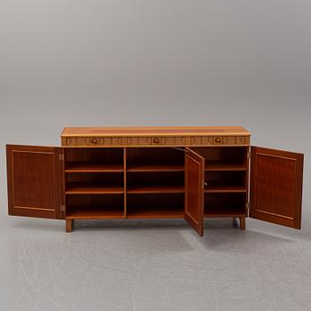Carl Malmsten, a 'Calmare Nyckel' walnut sideboard.