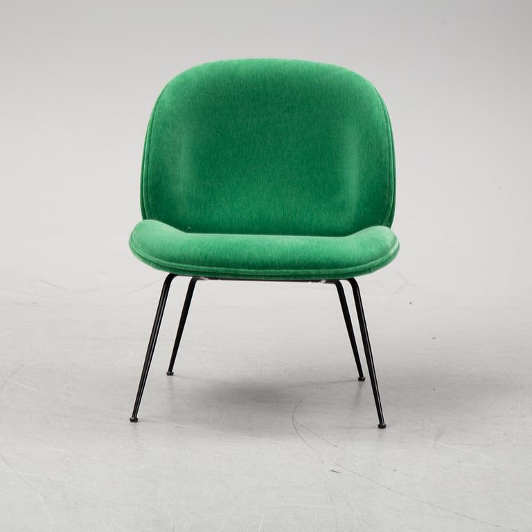 A 'Beetle Lounge Chair' by GamFratesi for Gubi, designed 2013.