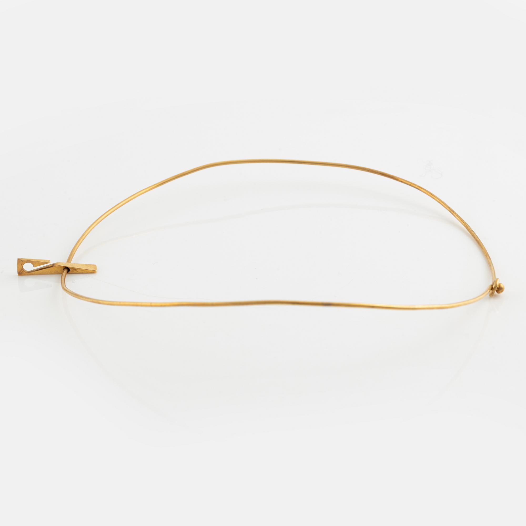 18K gold necklace.