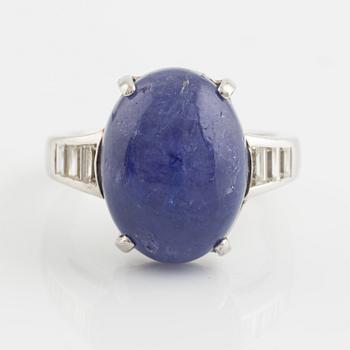 Cabochon cut tanzanite and baguette cut diamond ring.