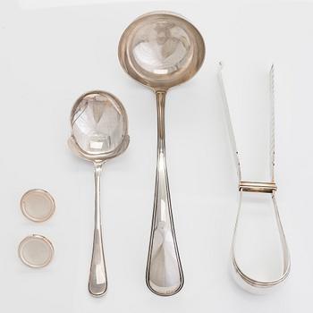 Serving cutlery, 3 pcs, silver, Netherlands 1883-1975, and a pair of silver cheese buttons, Finland 1971.