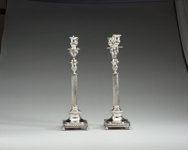 A pair of Swedish 18th century silver candleabra, makers mark of Mattias Engman, Stockholm 1796.