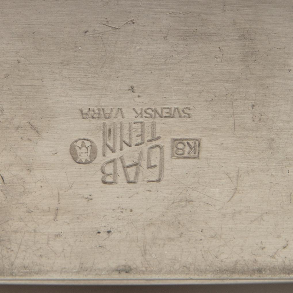 Cigarette case, candlesticks, ashtray, 4 pieces, GAB, 1936 -1938.