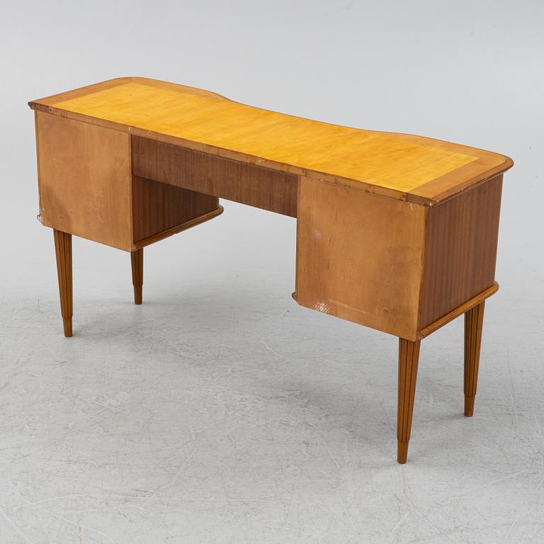 A Swedish Modern table, mid 20th Century.