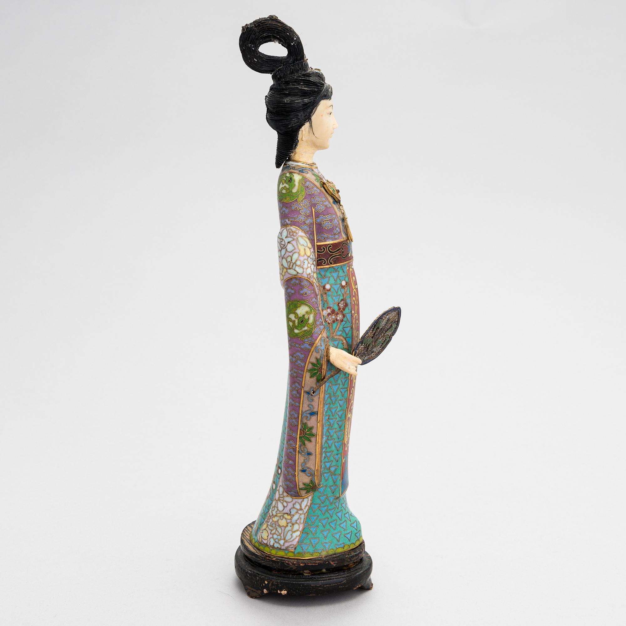 A cloisonné enamel Figurin from China, 1900s.