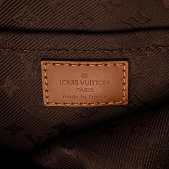 Louis Vuitton, an "Onatah GM" suede bag.