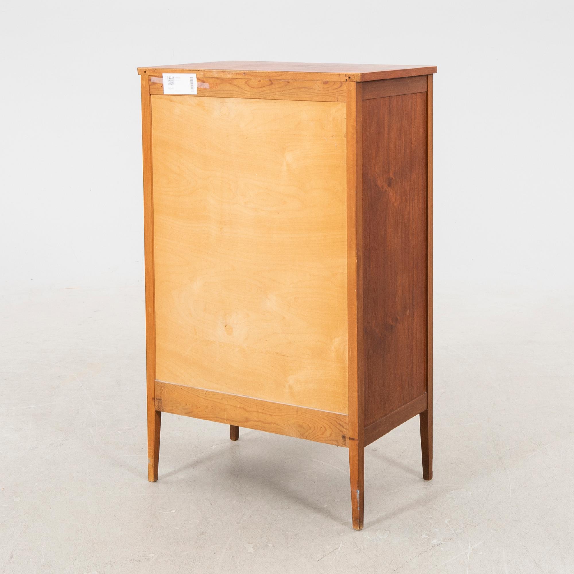 A 1960s stained dresser.