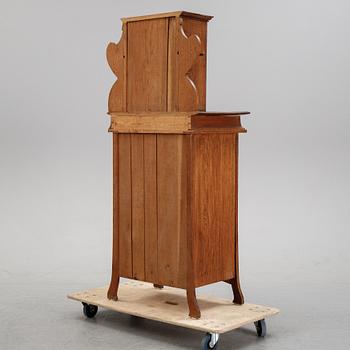 An oak art noveau cabinet, early 20th Century.