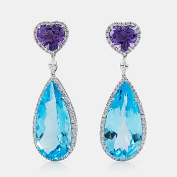 777. A pair of blue topaz, circa 30 cts, amethyst, circa 4 cts and diamond, circa 1.20 cts, earrings.