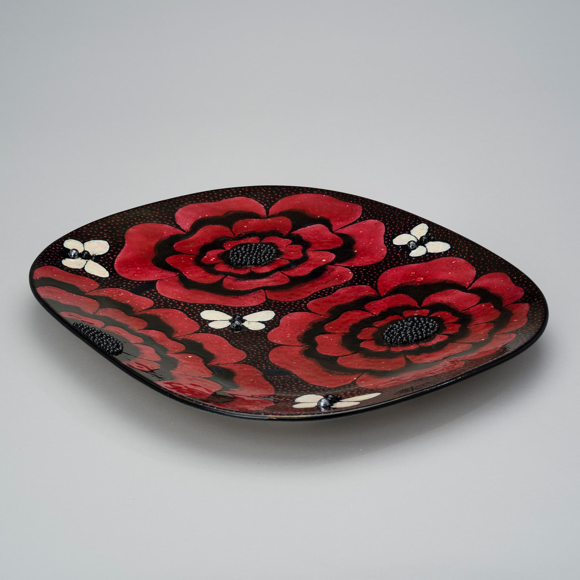 BIRGER KAIPIAINEN, A CERAMIC DISH. Butterflies and flowers. Signed Kaipiainen, Arabia. 1970s.