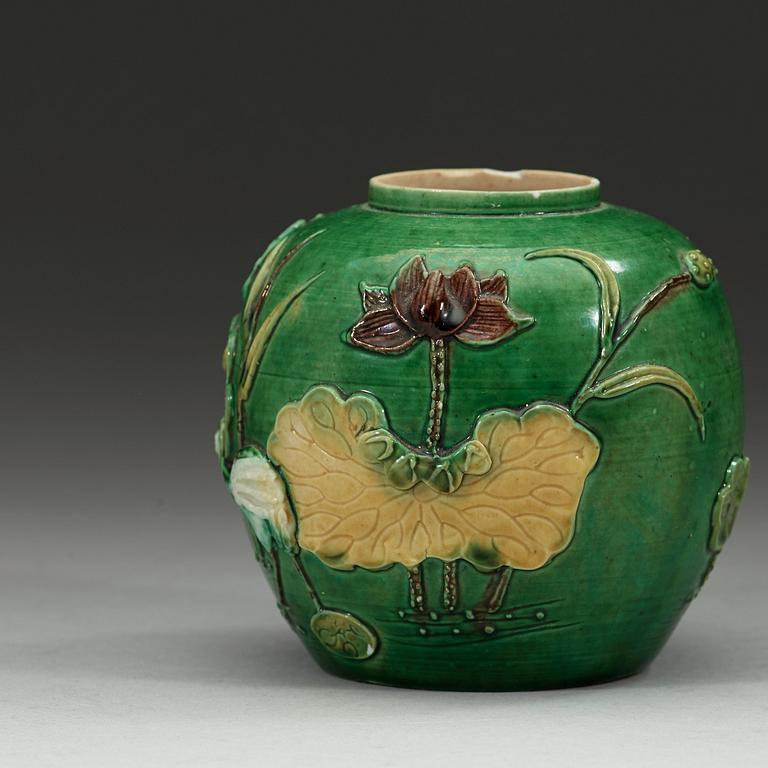 A green, aubergine and yellow glazed bisquit jar, Qing dynasty, 19th Century.