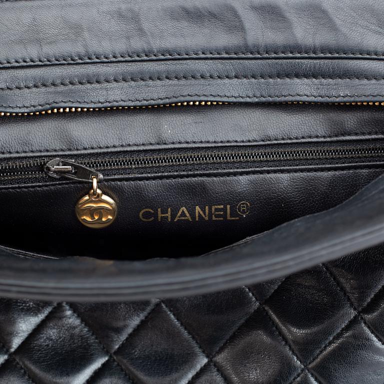 Chanel, a black quilted leather handbag, 1980's.