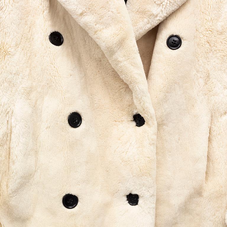 YVES SAINT LAURENT, a fur coat, size ca medium.