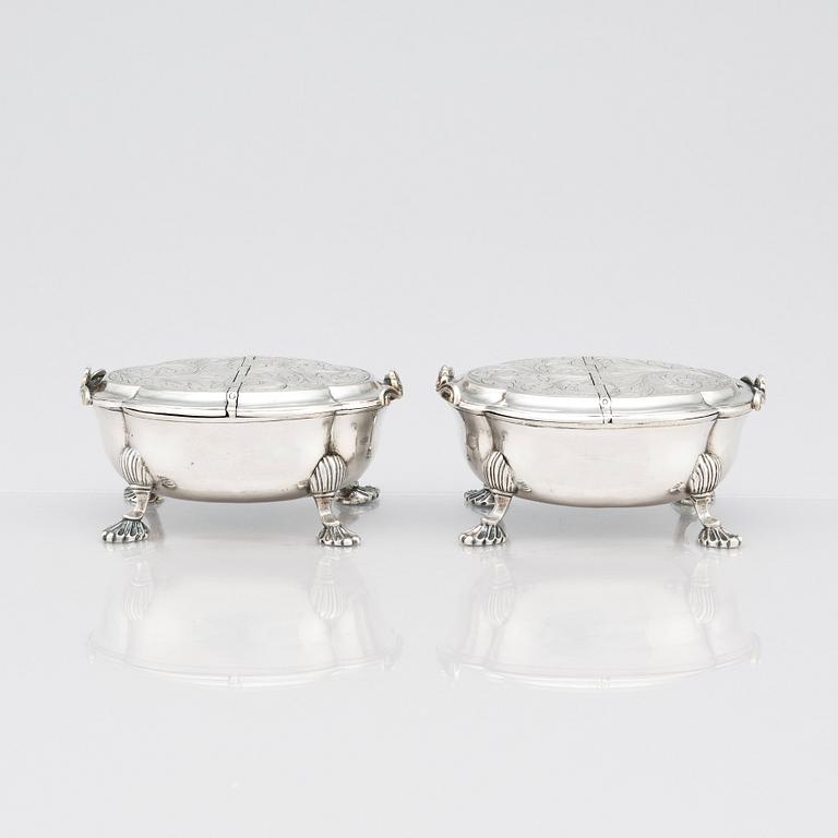 A pair of Latvian Rococo silver salt and pepper stands, marks of Johan Christian Henck (Henke), Riga 1768-80.